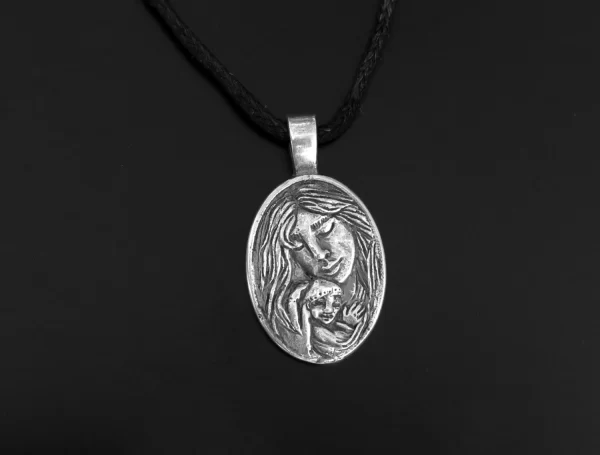 Mother and child silver pendant