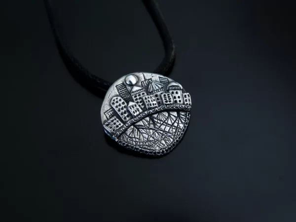 Silver city with roots pendant