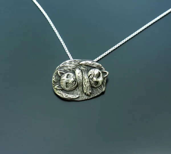 Hugging sleeping cats silver pendant