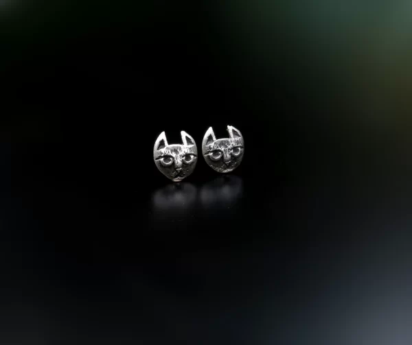 Silver stylized cat earrings