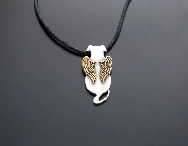 Silver angel dog with goldplated wings