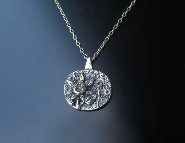 Silver sunflower field pendant