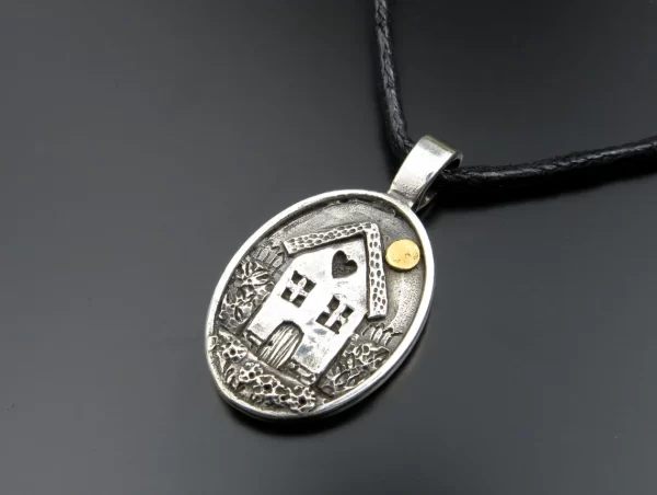 House under the sun silver pendant